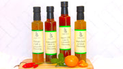 four bottles of Simply Stirred dressing