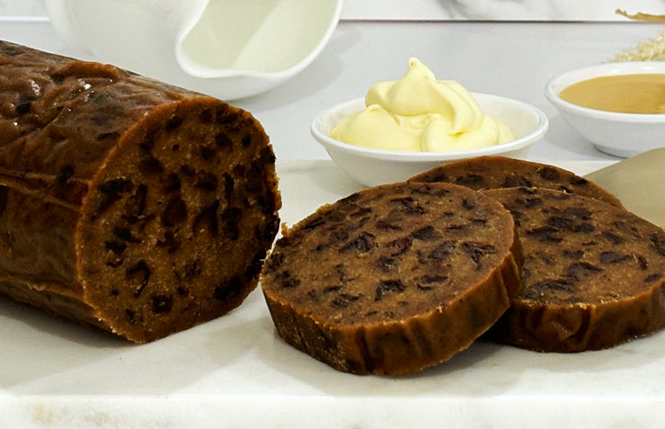 Slices of sticky date pudding plated